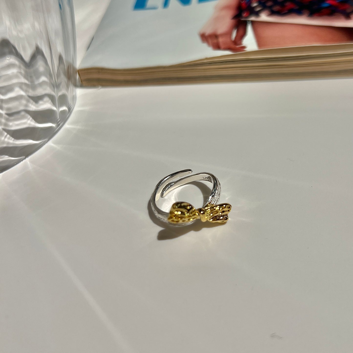 «GOLD BOW RING» — Adjustable Sterling Silver Band with Textured Gold Bow